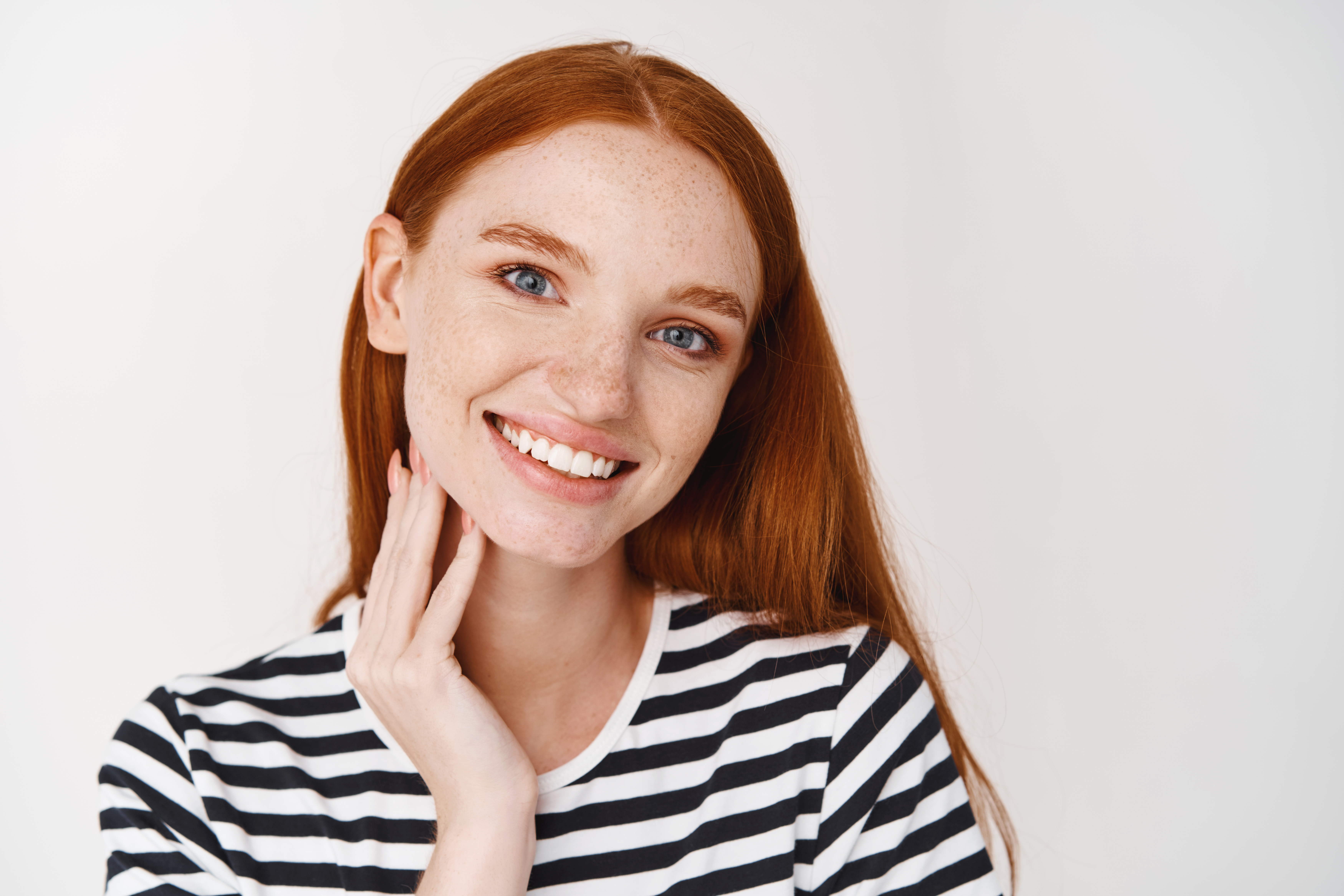 young-attractive-redhead-woman-smiling-looking-front